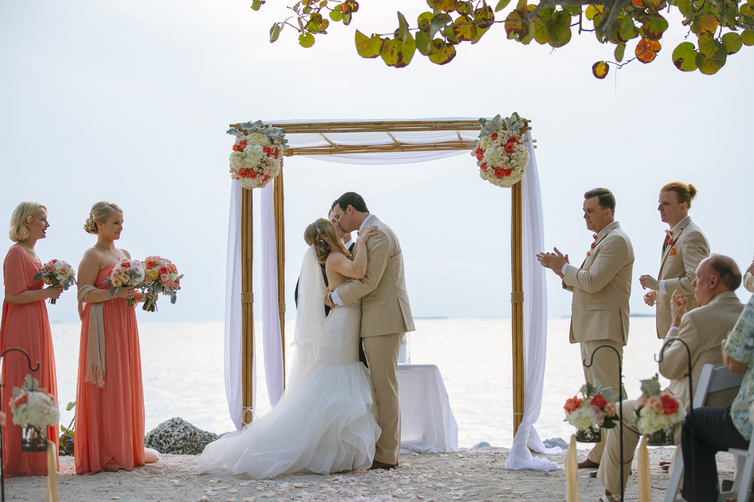 weddings by romi, wedding decor, fort zachary beach, reception pictures, beach wedding destination wedding, key west wedding photographer, bride and groom kiss