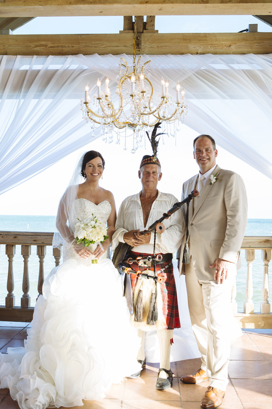 bag piper during the wedding picture, bag piper in key west, key west bag piper, key west wedding photographers, florida keys wedding photography, the waldorf astoria,