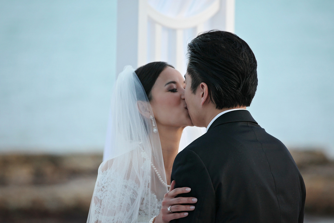 wedding kiss, bride and groom kissing, casa marina wedding