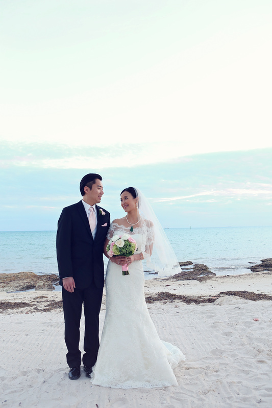 Tropical destination wedding picture, bride and groom
