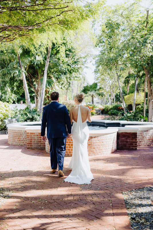 Bride and groom first look by the fountain at Truman Annex Key WestPicture