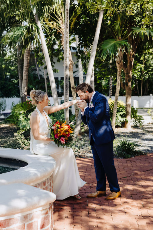 Bride and groom first look by the fountain at Truman Annex Key West Picture