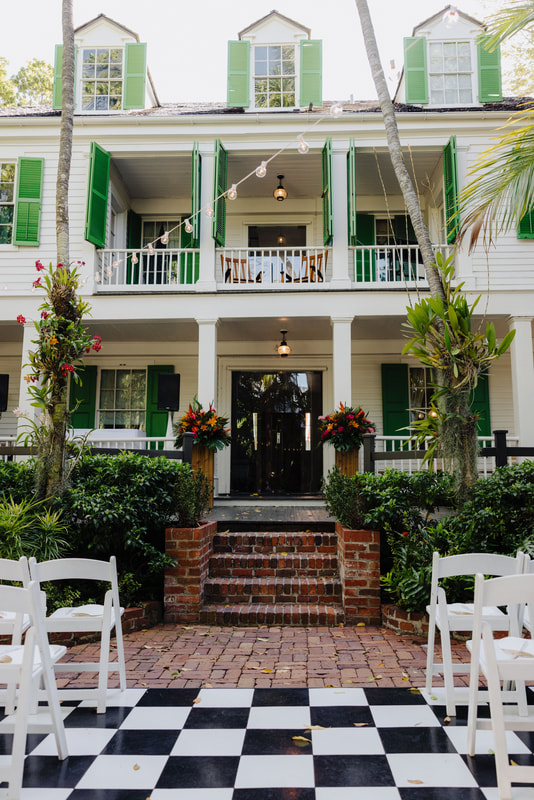 Vibrant tropical wedding reception at Audubon House in Key West Picture
