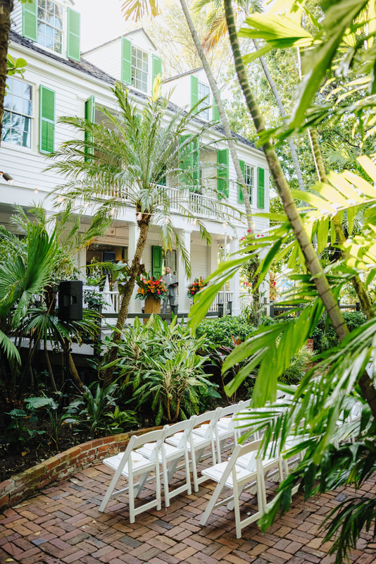 Vibrant tropical wedding reception at Audubon House in Key West Picture