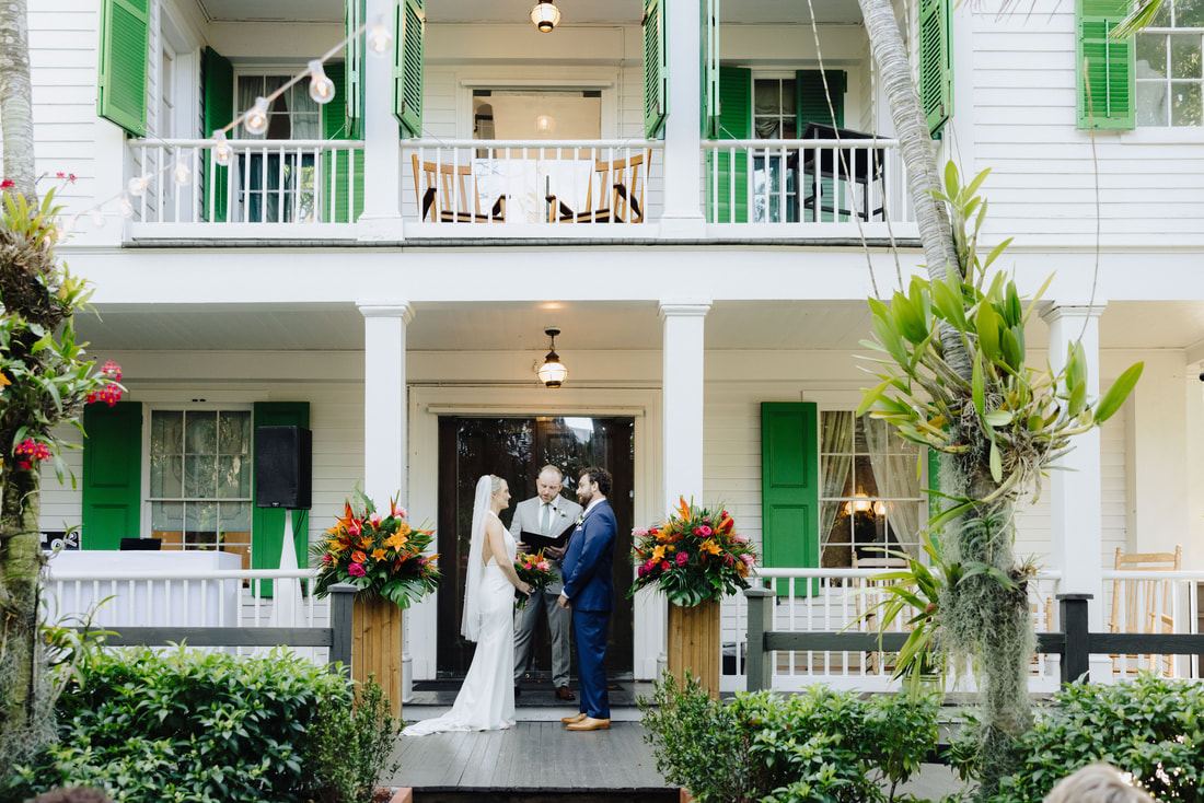 Bride walking down the aisle at historic Audubon House garden wedding Picture