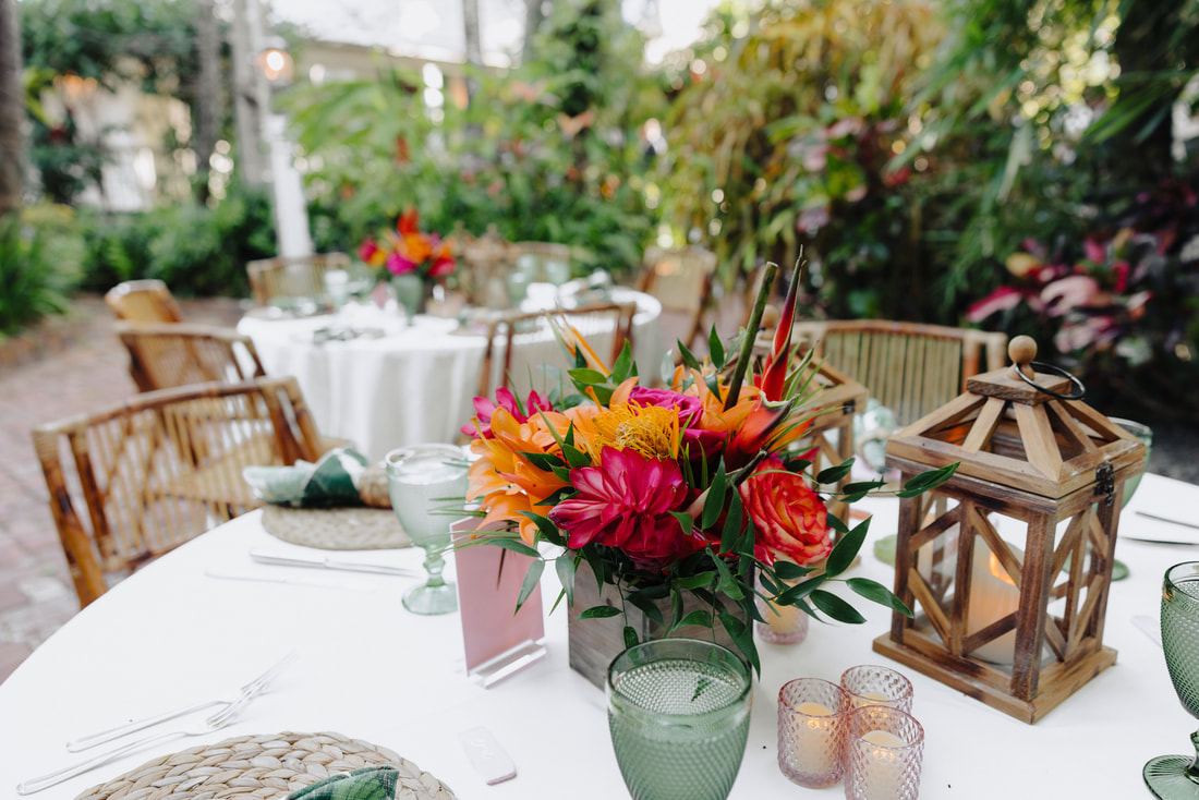 Key West wedding photographer captures ceremony under palm trees at historic venue Picture