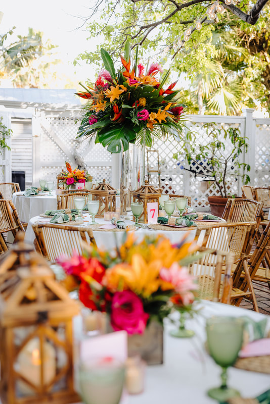 Key West wedding photographer captures ceremony under palm trees at historic venue Picture