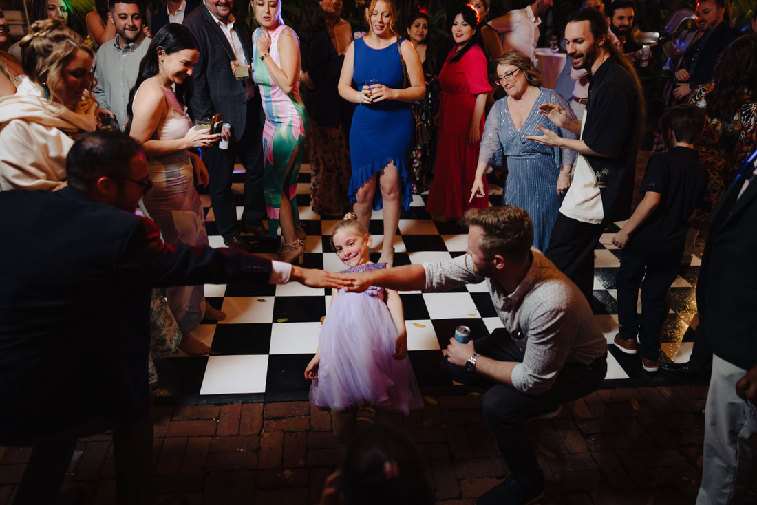 Key West photographer captures joyful first dance during intimate outdoor receptionPicture