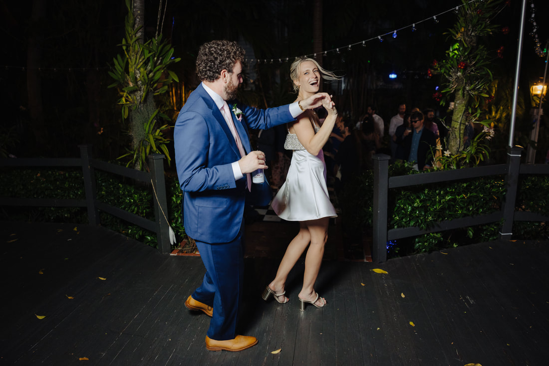 Bride and groom sharing their first dance at Audubon House, captured by Key West photographerPicture
