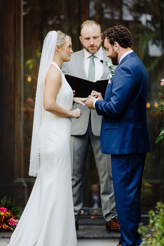 Outdoor wedding ceremony under lush tropical trees at Audubon House in Key West Picture