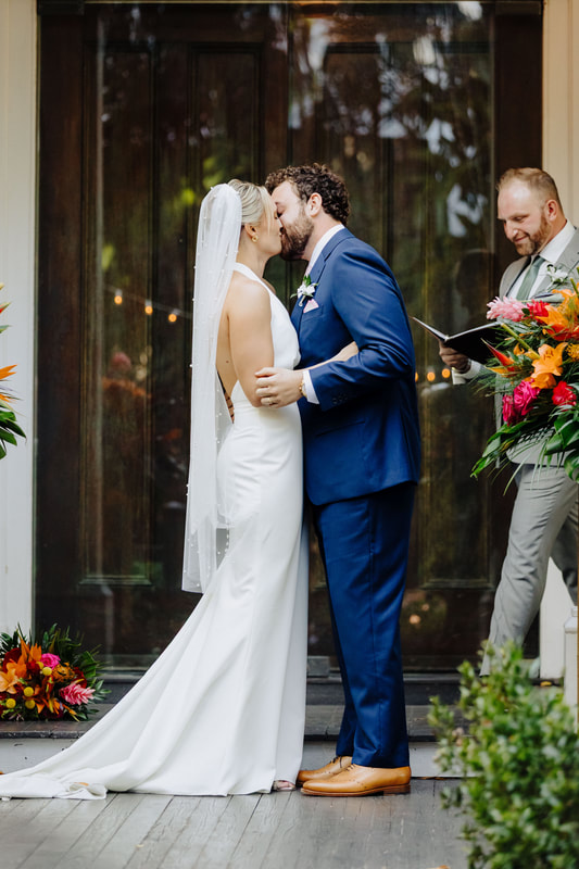 Outdoor wedding ceremony under lush tropical trees at Audubon House in Key West Picture