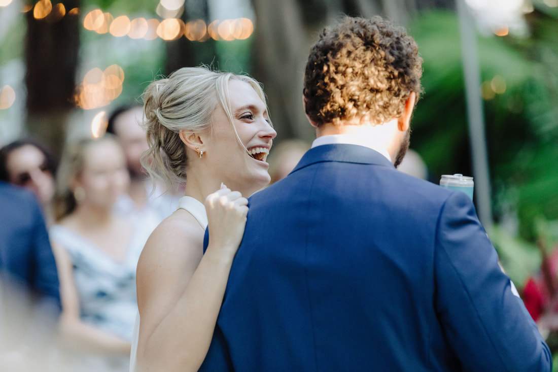 Candid moment during wedding speeches at lush Key West venue, captured by Key West photographer Picture
