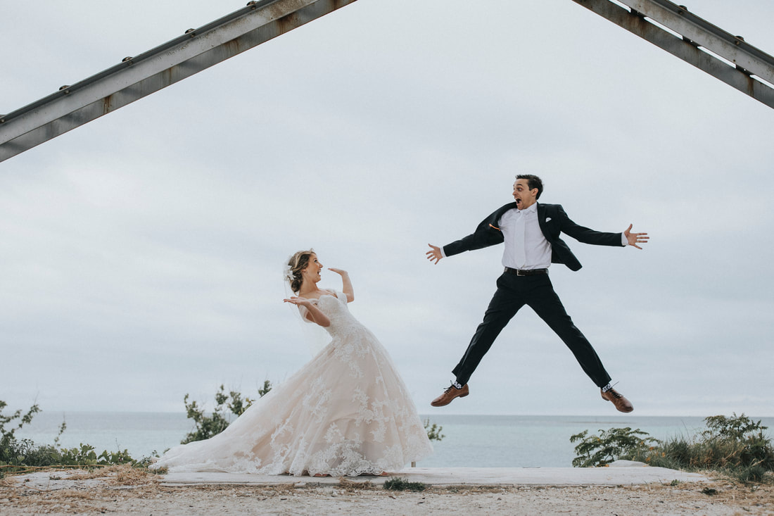 Bride and groom, Groom jumping, Jumping for joy, Fun wedding pictures, Key West wedding photographer, Key West wedding photography, Key West wedding photographers, Florida keys wedding, Key West wedding planner, Key West wedding venue