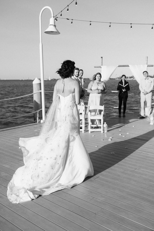 Bride walking down the isle in Hyatt Centric picture