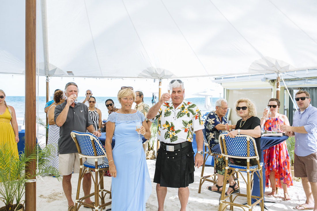 Family toasts during wedding, beach wedding, key West wedding, Key West wedding Photographers,