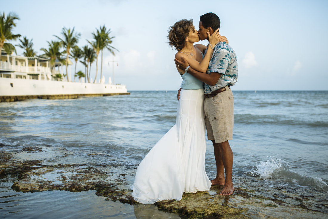 Bride and Groom, Southernmost Beach Resort, Beach wedding, Reflection, Key West wedding photographer, Weddings By Romi, Bride and groom kissing 