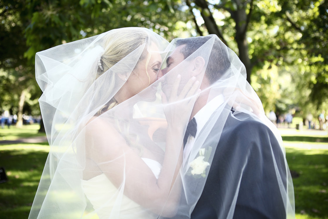 Boston Harbor Hotel, wedding venue in boston, boston wedding photographers, wedding photographers in boston, boston wedding photography, destination wedding in boston, bride and groom kissing, veil