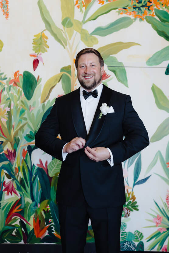 Groom getting ready in Casa Marina